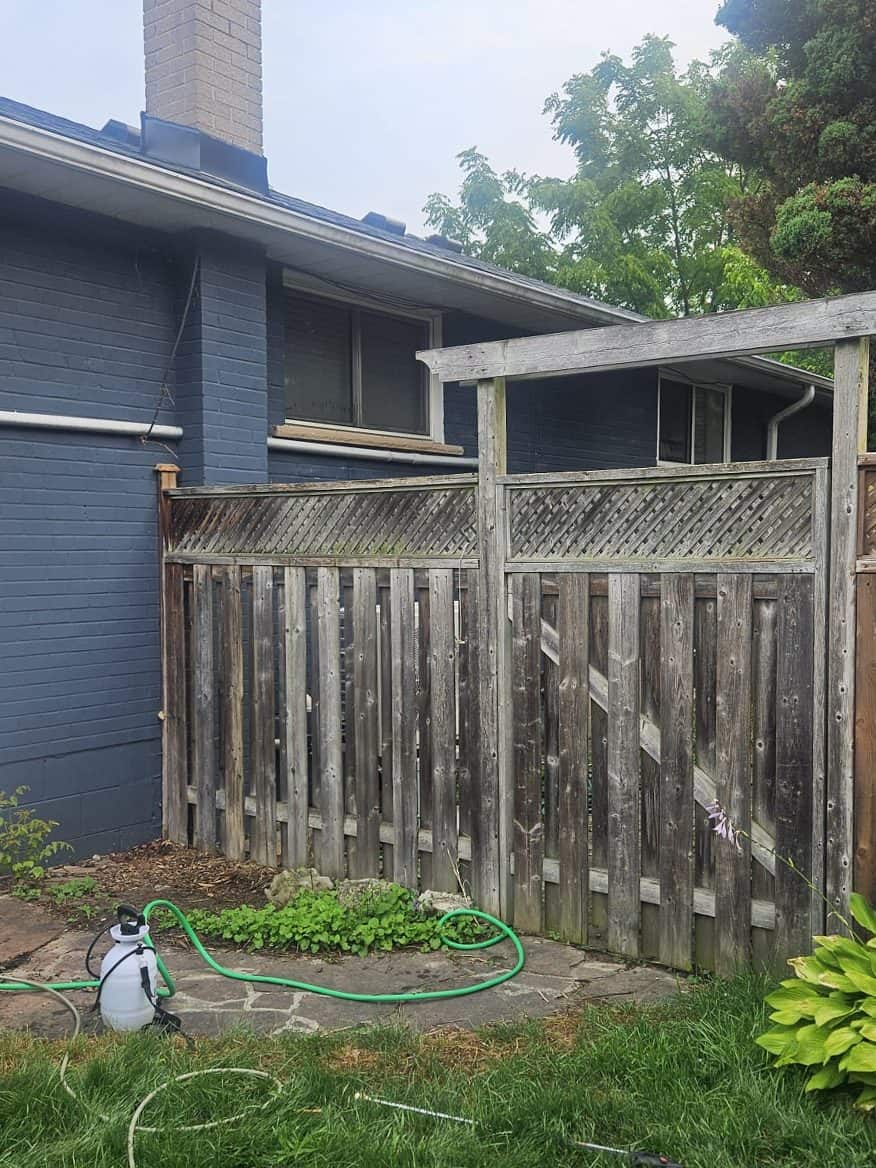 Wood fence and arbour, before